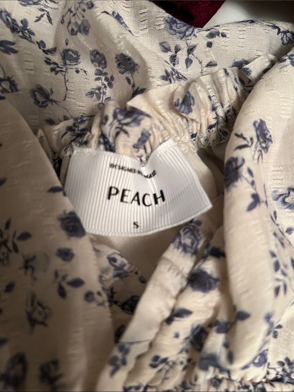Smocked Peplum Floral Top in White and Blue - Picture 7 of 8